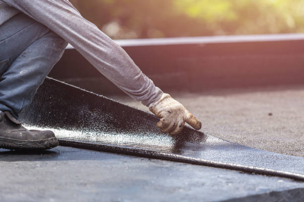 Professional Basement Waterproofing technician working in Sunman, IN